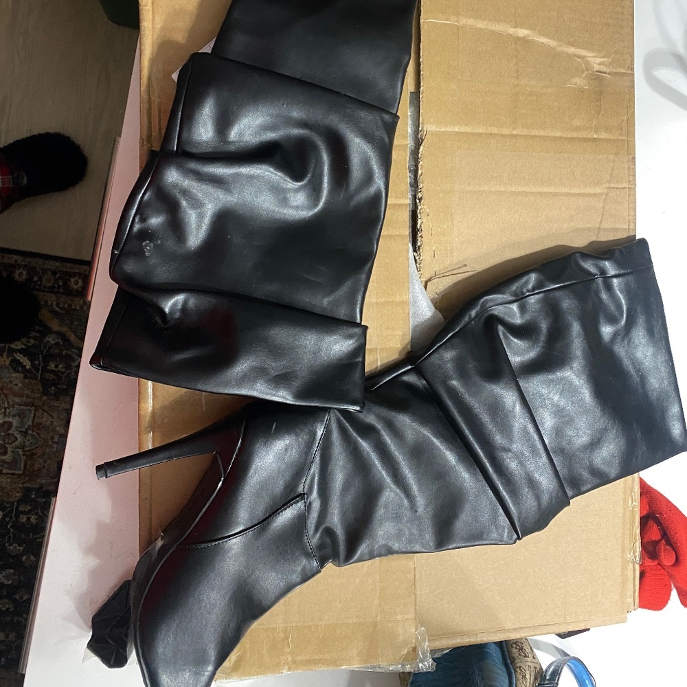 Black slouch knee high boots like new